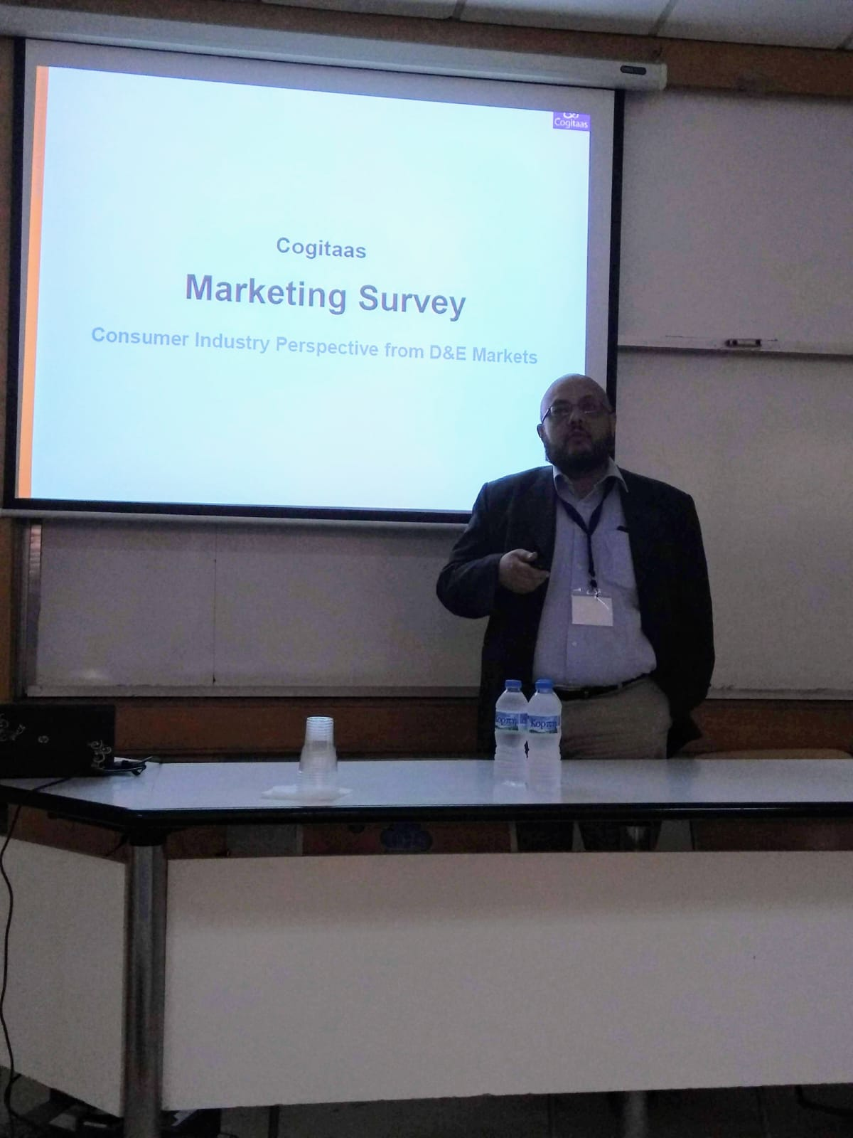 Dr. Kamal Sen presenting at a conference in Greece